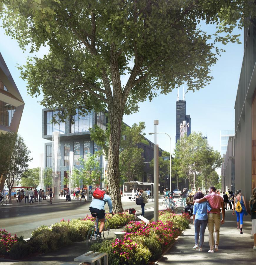 pedestrians, cyclists, and cars travel along Wells Street lined with trees